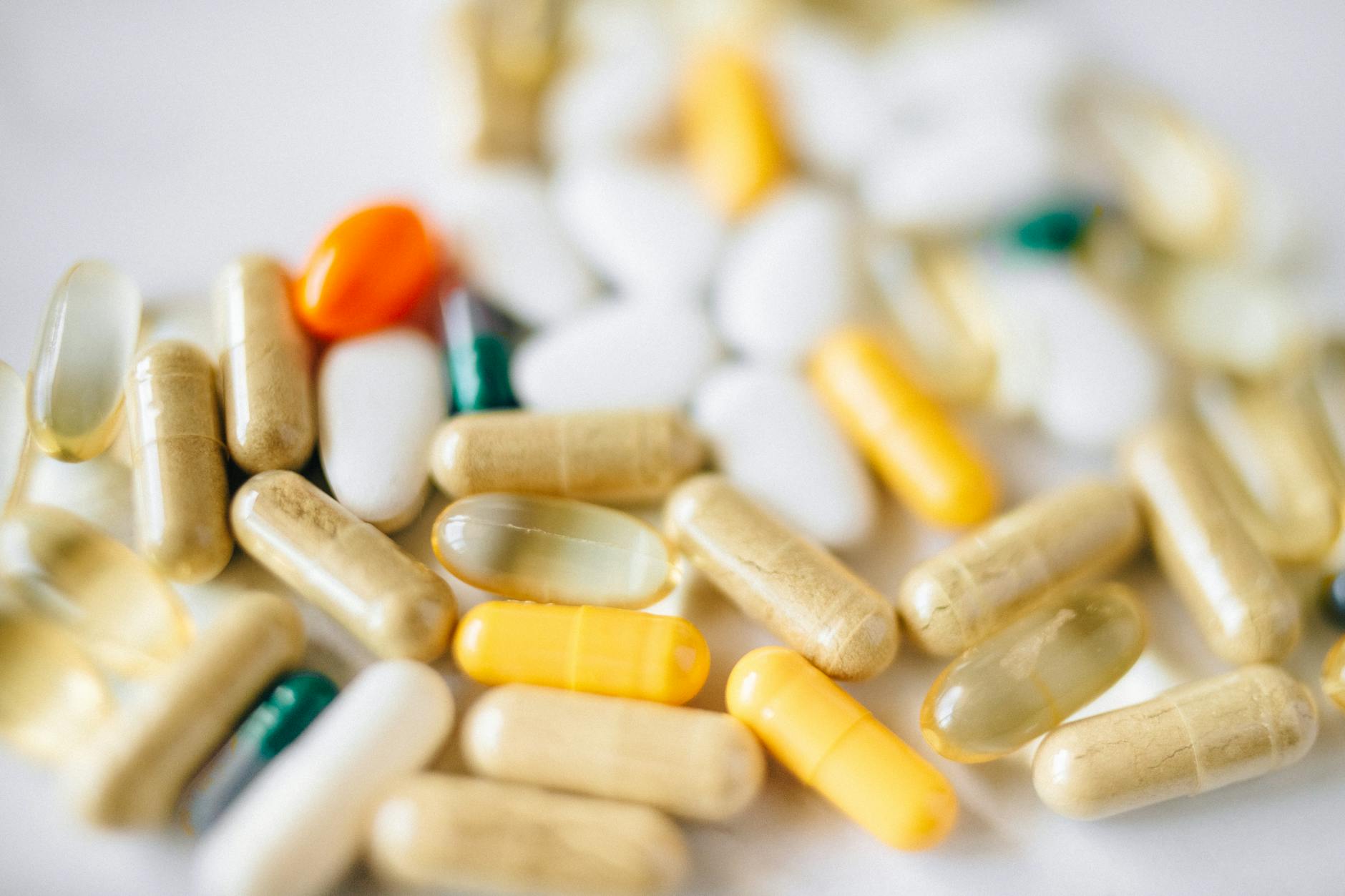 A close-up image of various pills and capsules showcasing diverse colors and types of pharmaceuti... (Photo by Nataliya Vaitkevich on Pexels)